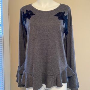 Grey ruffle shirt